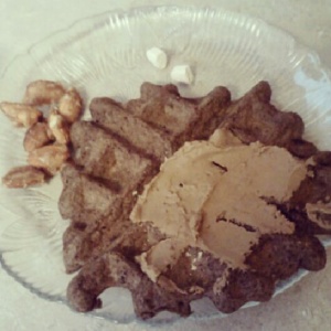 Chocolate peppermint buckwheat waffle with Garden of Life RAW chocolate protein frosting. 