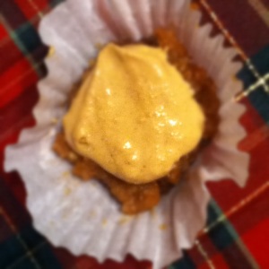 Raw carrot cake bite with peanut flour frosting. 