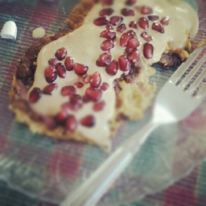 Breakfast: pumpkin chocolate chip almond flour pancakes topped with peanut flour paste and pomegranate arils. 